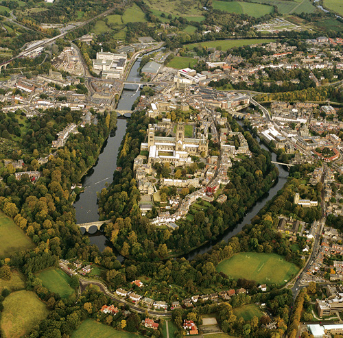 Durham World Heritage Site, as seen from the air. The Durham peninsula is a natural defensive site. Only the peninsula neck was vulnerable, hence the construction of the strongest Castle defenses there. The steep river banks made the rest of the peninsula impossible to attack.  